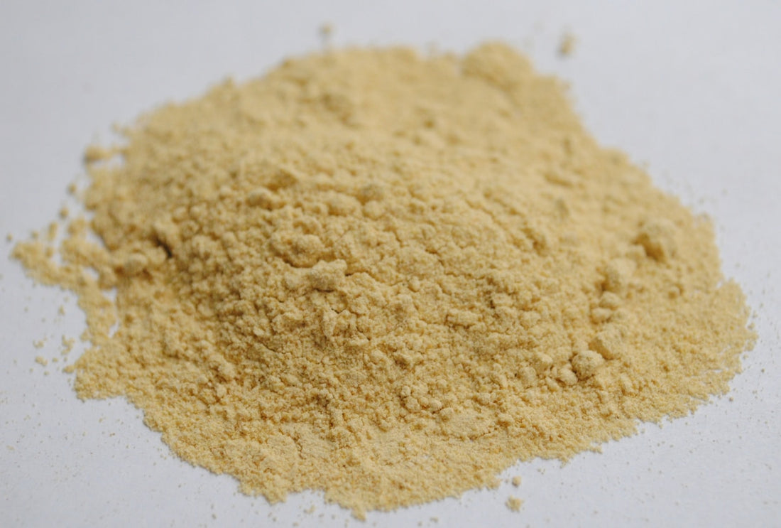 Pile of fine brown powder, similar in texture to dried tokosh